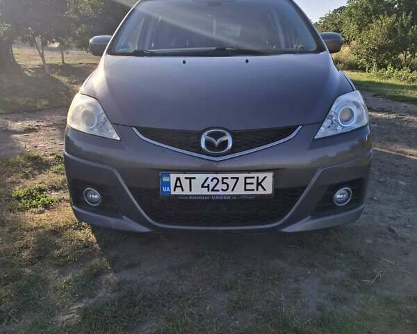 Серый Мазда 5, объемом двигателя 2 л и пробегом 247 тыс. км за 7200 $, фото 1 на Automoto.ua