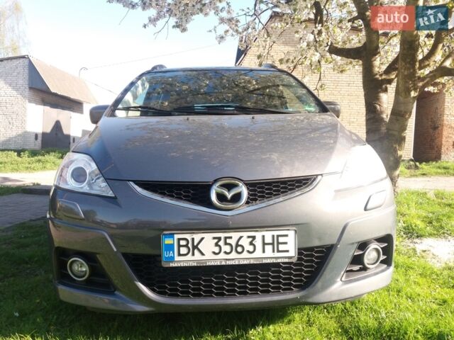 Серый Мазда 5, объемом двигателя 2 л и пробегом 270 тыс. км за 6500 $, фото 1 на Automoto.ua