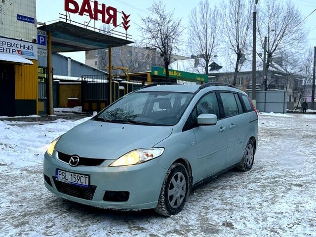 Сірий Мазда 5, об'ємом двигуна 2 л та пробігом 24600 тис. км за 2850 $, фото 1 на Automoto.ua