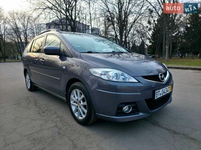 Серый Мазда 5, объемом двигателя 1.8 л и пробегом 216 тыс. км за 5699 $, фото 1 на Automoto.ua