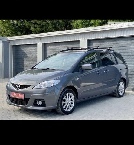 Серый Мазда 5, объемом двигателя 2 л и пробегом 220 тыс. км за 7100 $, фото 1 на Automoto.ua