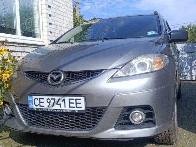 Серый Мазда 5, объемом двигателя 2 л и пробегом 217 тыс. км за 5700 $, фото 1 на Automoto.ua