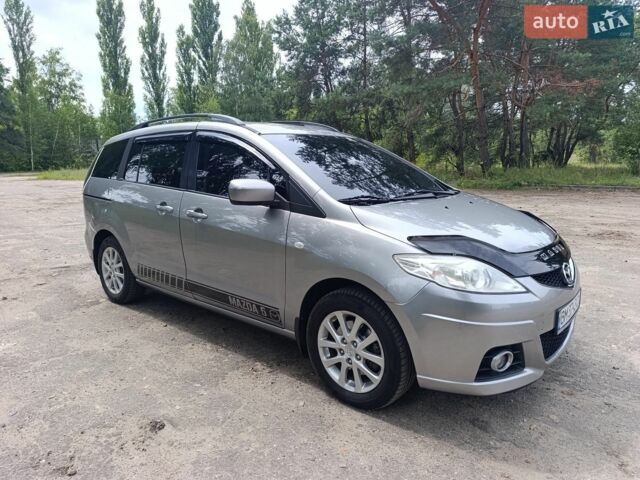 Серый Мазда 5, объемом двигателя 2 л и пробегом 224 тыс. км за 6850 $, фото 1 на Automoto.ua