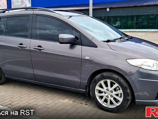 Серый Мазда 5, объемом двигателя 2 л и пробегом 250 тыс. км за 6900 $, фото 1 на Automoto.ua
