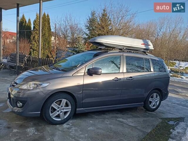 Серый Мазда 5, объемом двигателя 2 л и пробегом 230 тыс. км за 9200 $, фото 1 на Automoto.ua