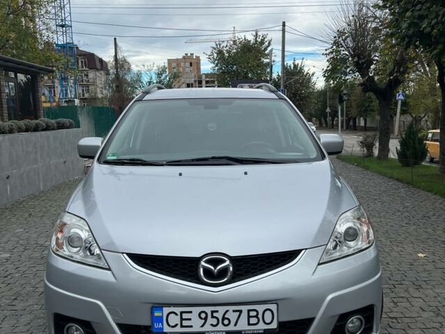 Серый Мазда 5, объемом двигателя 2 л и пробегом 270 тыс. км за 7500 $, фото 1 на Automoto.ua