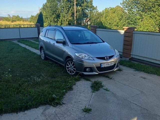 Серый Мазда 5, объемом двигателя 2 л и пробегом 257 тыс. км за 4800 $, фото 1 на Automoto.ua