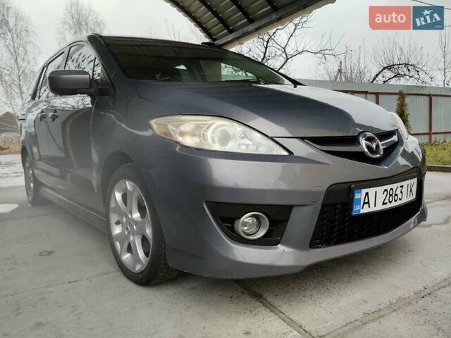 Сірий Мазда 5, об'ємом двигуна 2.3 л та пробігом 242 тис. км за 7500 $, фото 1 на Automoto.ua