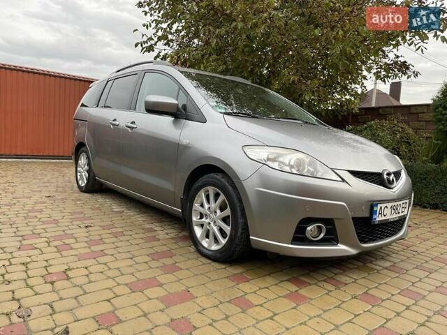 Серый Мазда 5, объемом двигателя 2 л и пробегом 253 тыс. км за 7250 $, фото 1 на Automoto.ua