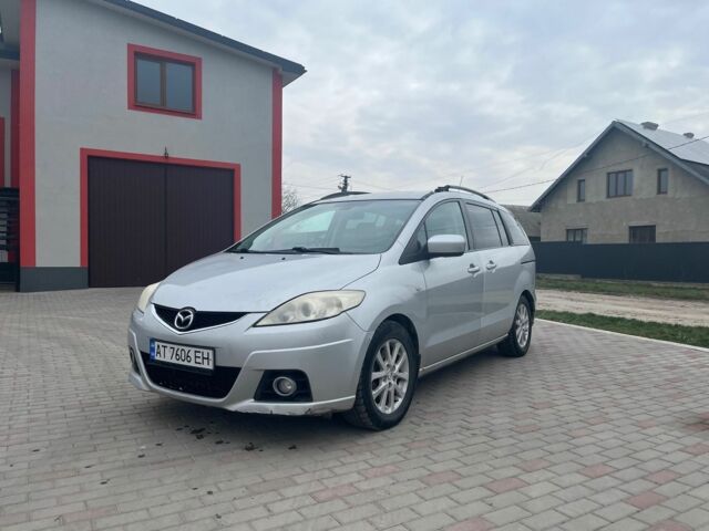 Серый Мазда 5, объемом двигателя 2 л и пробегом 320 тыс. км за 4500 $, фото 1 на Automoto.ua