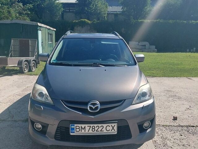 Серый Мазда 5, объемом двигателя 2 л и пробегом 234 тыс. км за 7800 $, фото 1 на Automoto.ua