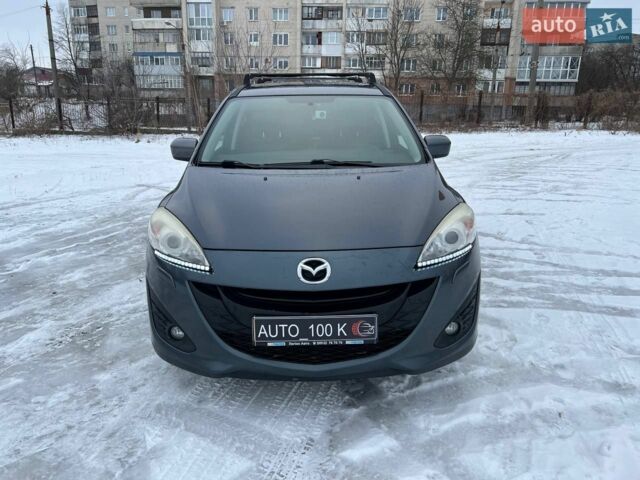 Серый Мазда 5, объемом двигателя 2 л и пробегом 189 тыс. км за 10050 $, фото 1 на Automoto.ua