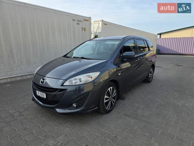 Серый Мазда 5, объемом двигателя 2 л и пробегом 285 тыс. км за 6350 $, фото 1 на Automoto.ua