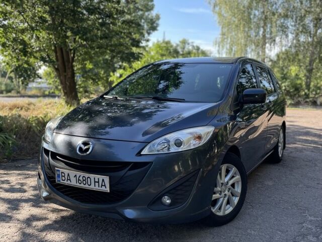 Серый Мазда 5, объемом двигателя 1.6 л и пробегом 220 тыс. км за 7800 $, фото 1 на Automoto.ua