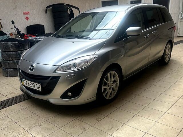 Серый Мазда 5, объемом двигателя 2 л и пробегом 101 тыс. км за 9500 $, фото 1 на Automoto.ua
