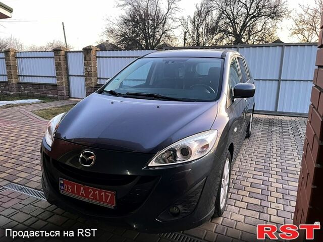 Серый Мазда 5, объемом двигателя 1.6 л и пробегом 278 тыс. км за 8300 $, фото 1 на Automoto.ua
