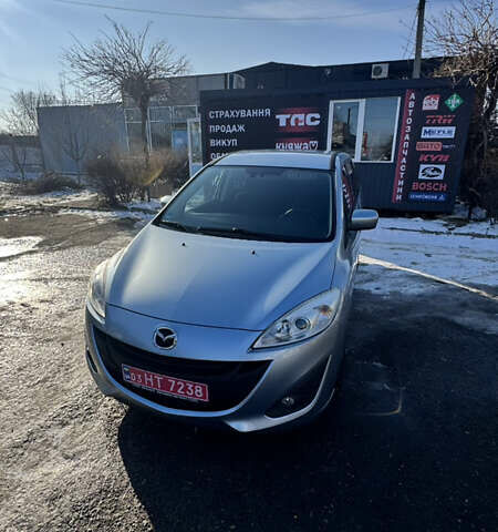 Серый Мазда 5, объемом двигателя 2 л и пробегом 98 тыс. км за 9499 $, фото 1 на Automoto.ua