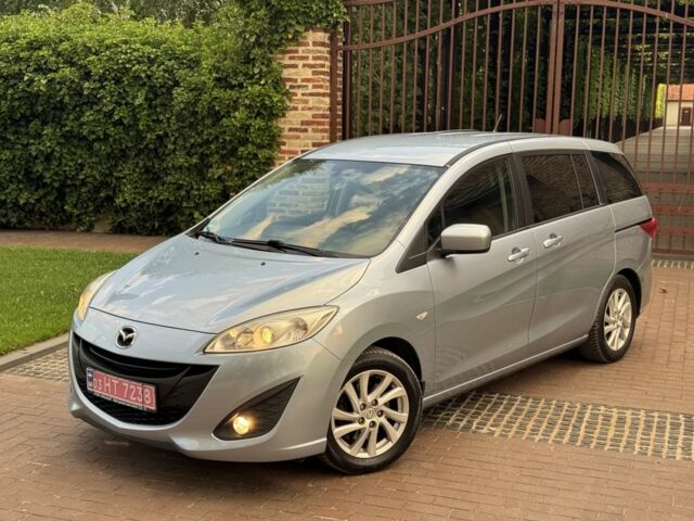 Серый Мазда 5, объемом двигателя 1.8 л и пробегом 99 тыс. км за 6650 $, фото 1 на Automoto.ua