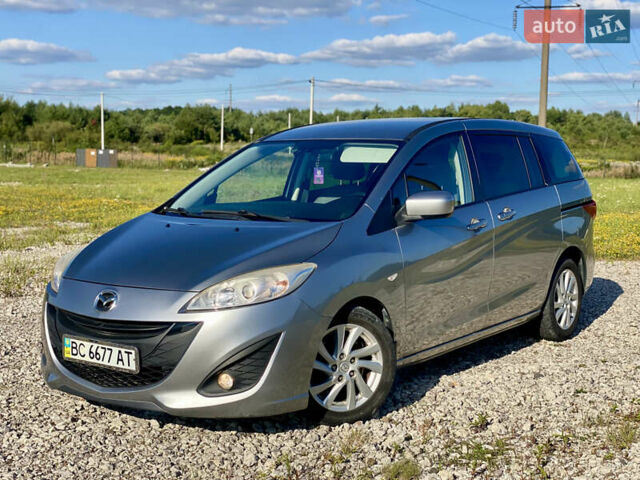 Серый Мазда 5, объемом двигателя 2 л и пробегом 150 тыс. км за 7599 $, фото 1 на Automoto.ua