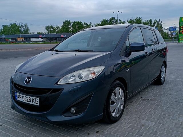 Серый Мазда 5, объемом двигателя 2 л и пробегом 210 тыс. км за 7800 $, фото 1 на Automoto.ua