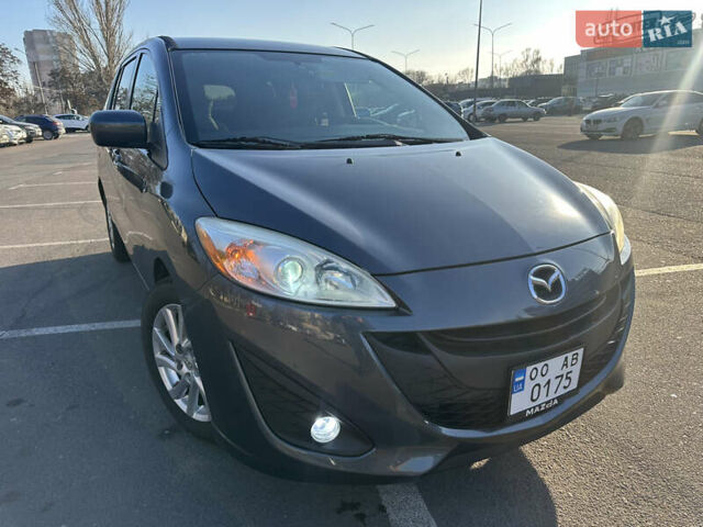 Серый Мазда 5, объемом двигателя 2.5 л и пробегом 170 тыс. км за 8600 $, фото 1 на Automoto.ua