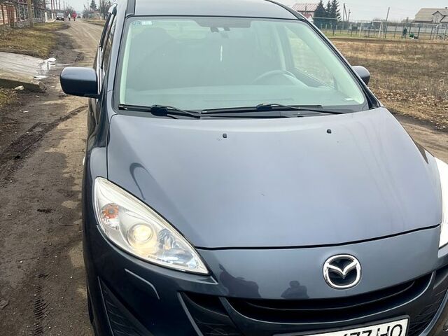 Серый Мазда 5, объемом двигателя 2 л и пробегом 180 тыс. км за 8500 $, фото 1 на Automoto.ua