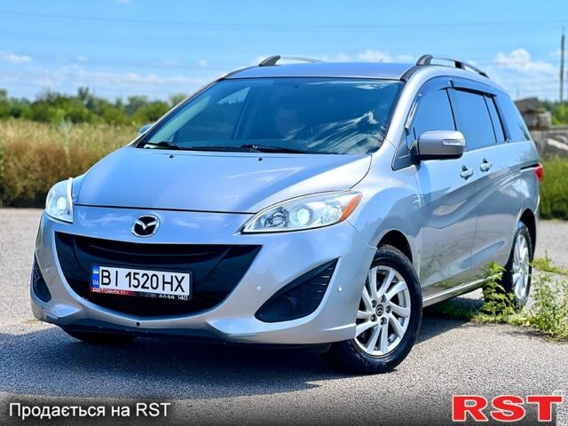 Серый Мазда 5, объемом двигателя 2.5 л и пробегом 310 тыс. км за 6500 $, фото 1 на Automoto.ua