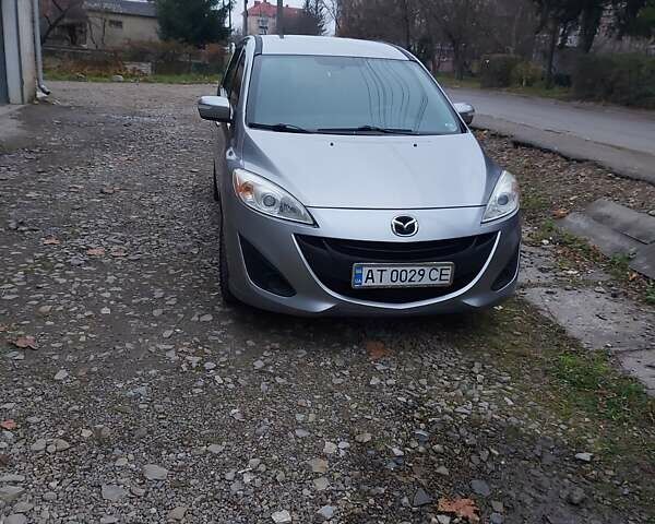 Серый Мазда 5, объемом двигателя 2.49 л и пробегом 145 тыс. км за 9000 $, фото 1 на Automoto.ua