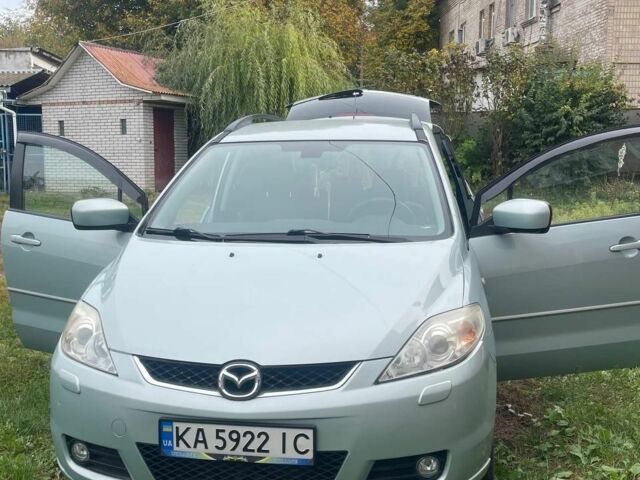 Серый Мазда 5, объемом двигателя 2 л и пробегом 230 тыс. км за 3999 $, фото 1 на Automoto.ua