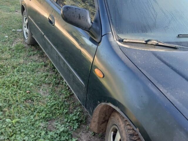 Синій Мазда 5, об'ємом двигуна 1.5 л та пробігом 350 тис. км за 1305 $, фото 1 на Automoto.ua