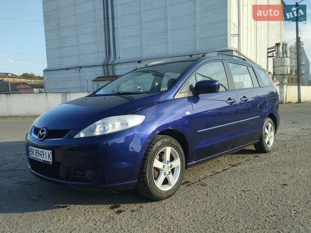 Синий Мазда 5, объемом двигателя 2 л и пробегом 262 тыс. км за 4300 $, фото 1 на Automoto.ua