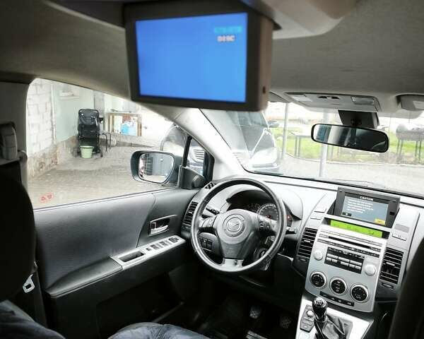 Синий Мазда 5, объемом двигателя 2 л и пробегом 187 тыс. км за 4999 $, фото 1 на Automoto.ua