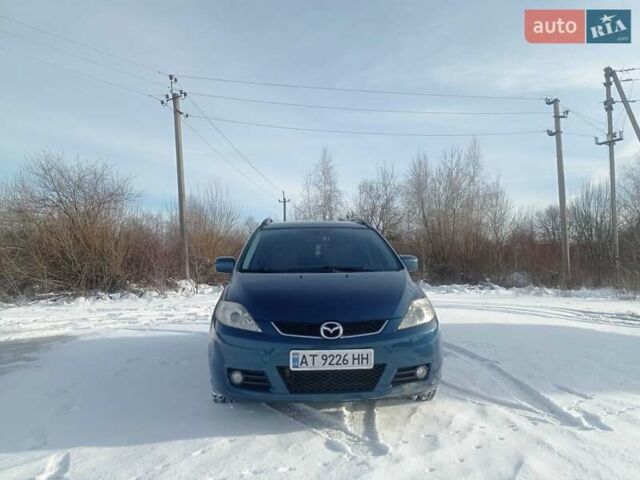 Синий Мазда 5, объемом двигателя 1.8 л и пробегом 235 тыс. км за 5000 $, фото 1 на Automoto.ua
