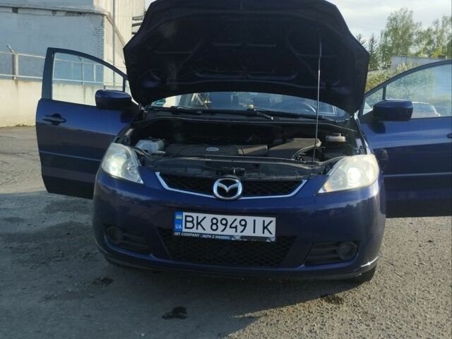 Синій Мазда 5, об'ємом двигуна 2 л та пробігом 262 тис. км за 4199 $, фото 1 на Automoto.ua