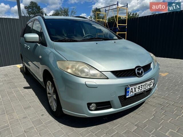 Синий Мазда 5, объемом двигателя 2 л и пробегом 250 тыс. км за 3850 $, фото 1 на Automoto.ua