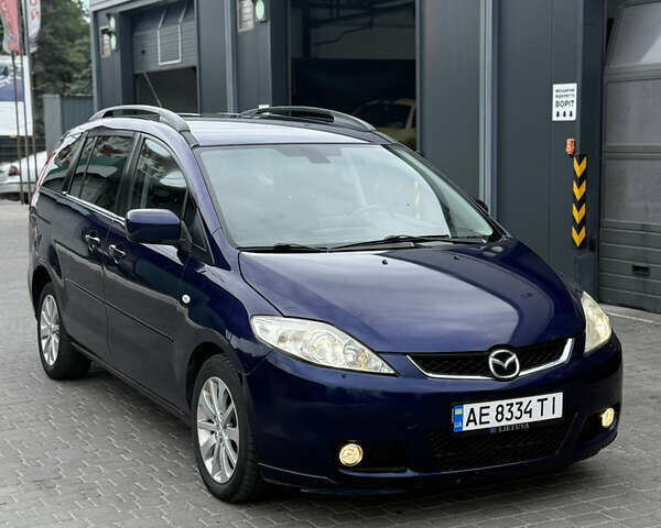 Синий Мазда 5, объемом двигателя 2 л и пробегом 214 тыс. км за 4750 $, фото 1 на Automoto.ua
