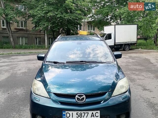 Синий Мазда 5, объемом двигателя 2 л и пробегом 250 тыс. км за 2800 $, фото 1 на Automoto.ua
