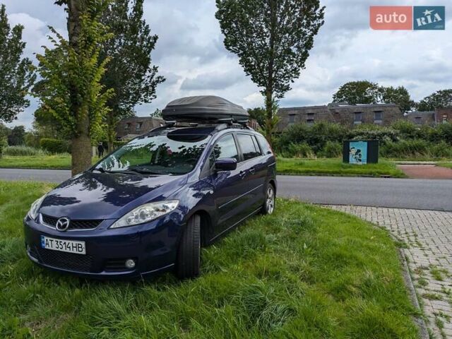 Синий Мазда 5, объемом двигателя 2 л и пробегом 240 тыс. км за 7697 $, фото 1 на Automoto.ua