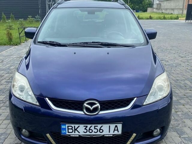 Синий Мазда 5, объемом двигателя 2 л и пробегом 200 тыс. км за 4500 $, фото 1 на Automoto.ua