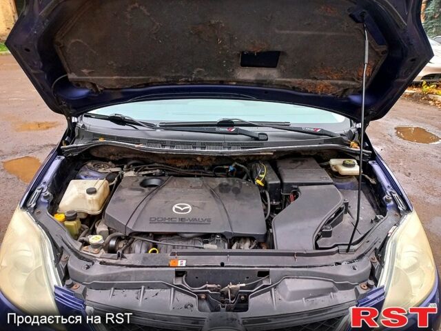 Синий Мазда 5, объемом двигателя 1.8 л и пробегом 300 тыс. км за 5400 $, фото 1 на Automoto.ua