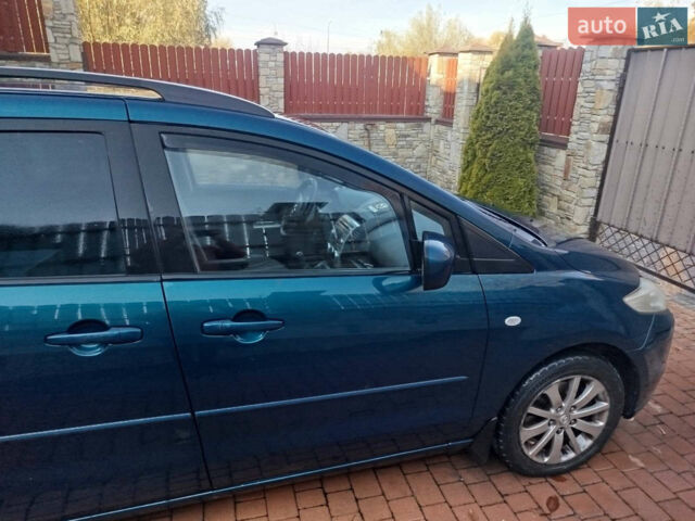 Синий Мазда 5, объемом двигателя 2 л и пробегом 260 тыс. км за 4500 $, фото 1 на Automoto.ua