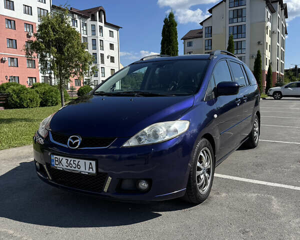 Синий Мазда 5, объемом двигателя 2 л и пробегом 195 тыс. км за 5100 $, фото 1 на Automoto.ua