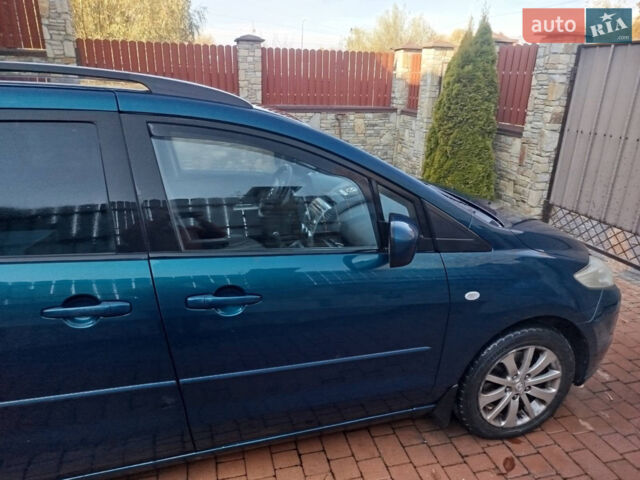 Синий Мазда 5, объемом двигателя 2 л и пробегом 260 тыс. км за 4500 $, фото 1 на Automoto.ua