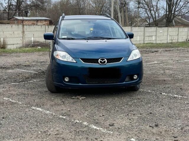 Синий Мазда 5, объемом двигателя 2 л и пробегом 265 тыс. км за 3600 $, фото 1 на Automoto.ua