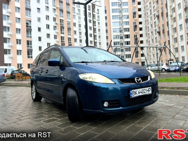 Синій Мазда 5, об'ємом двигуна 2 л та пробігом 245 тис. км за 4750 $, фото 1 на Automoto.ua