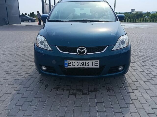Синий Мазда 5, объемом двигателя 2 л и пробегом 255 тыс. км за 5500 $, фото 1 на Automoto.ua