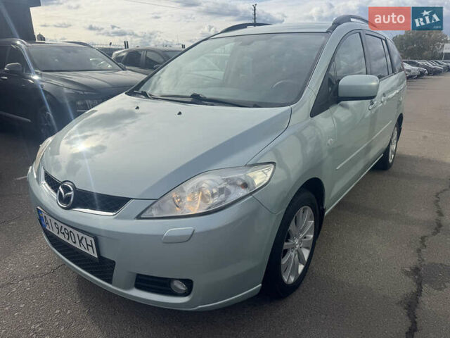 Синий Мазда 5, объемом двигателя 2 л и пробегом 183 тыс. км за 4999 $, фото 1 на Automoto.ua