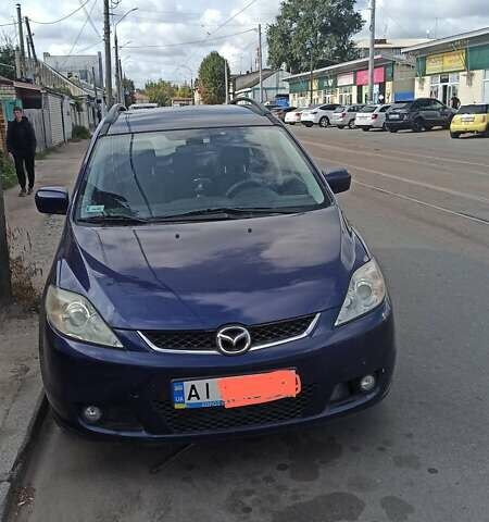 Синий Мазда 5, объемом двигателя 2 л и пробегом 250 тыс. км за 5100 $, фото 1 на Automoto.ua