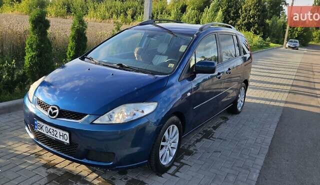 Синий Мазда 5, объемом двигателя 2 л и пробегом 293 тыс. км за 4800 $, фото 1 на Automoto.ua