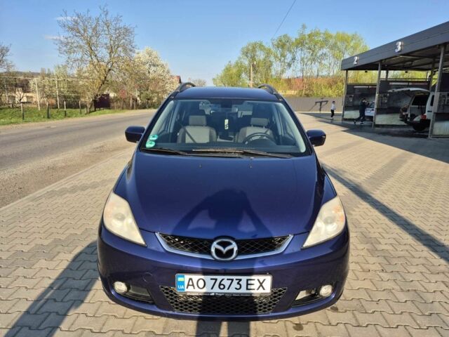 Синий Мазда 5, объемом двигателя 2 л и пробегом 260 тыс. км за 5109 $, фото 1 на Automoto.ua